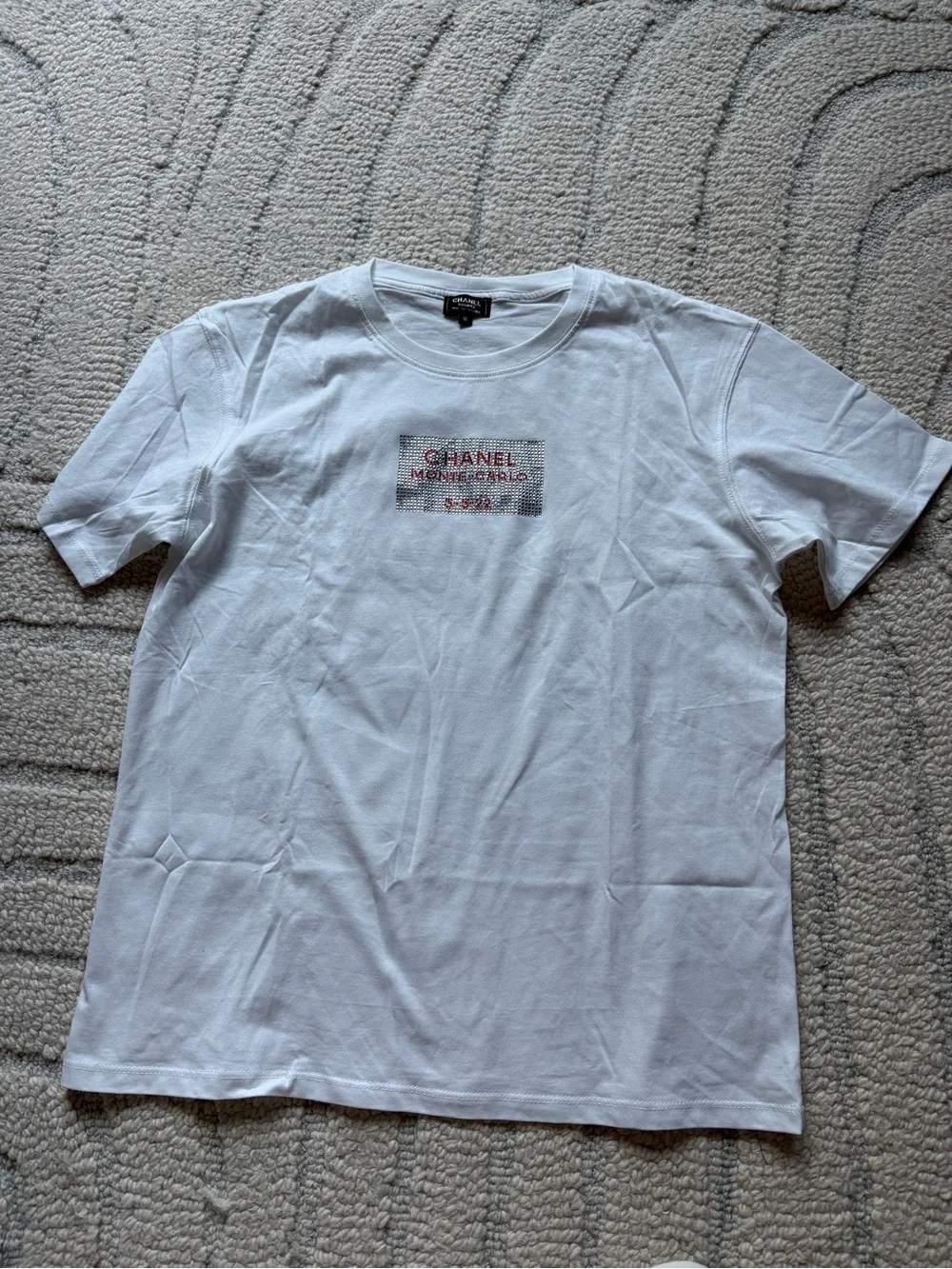 CHANEL White Short-Sleeve Tee with Red Logo Patch